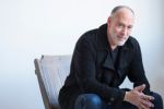 Marc Cohn sitting in a chair