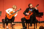 students playing guitars