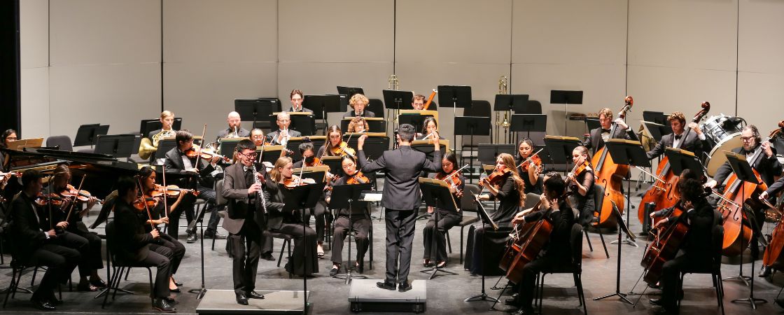 jazz and wind ensemble performing on stage