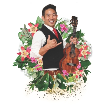 Jake surrounded by festive holiday lei