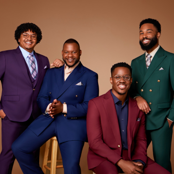 woman leaning against guitar