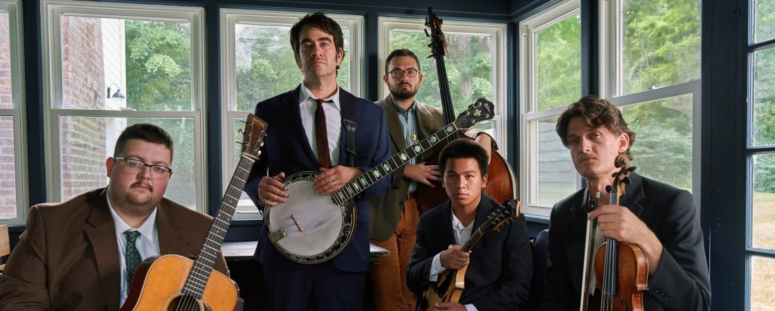 boys in sunroom with their instruments