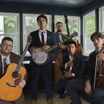 folk musicians standing together