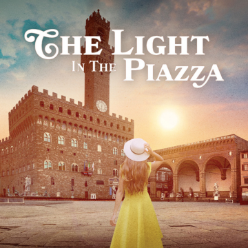 Woman in yellow dress with white hat facing away from the viewer in Florence