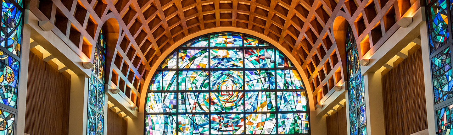 stained glass chapel with wood coffered ceiling