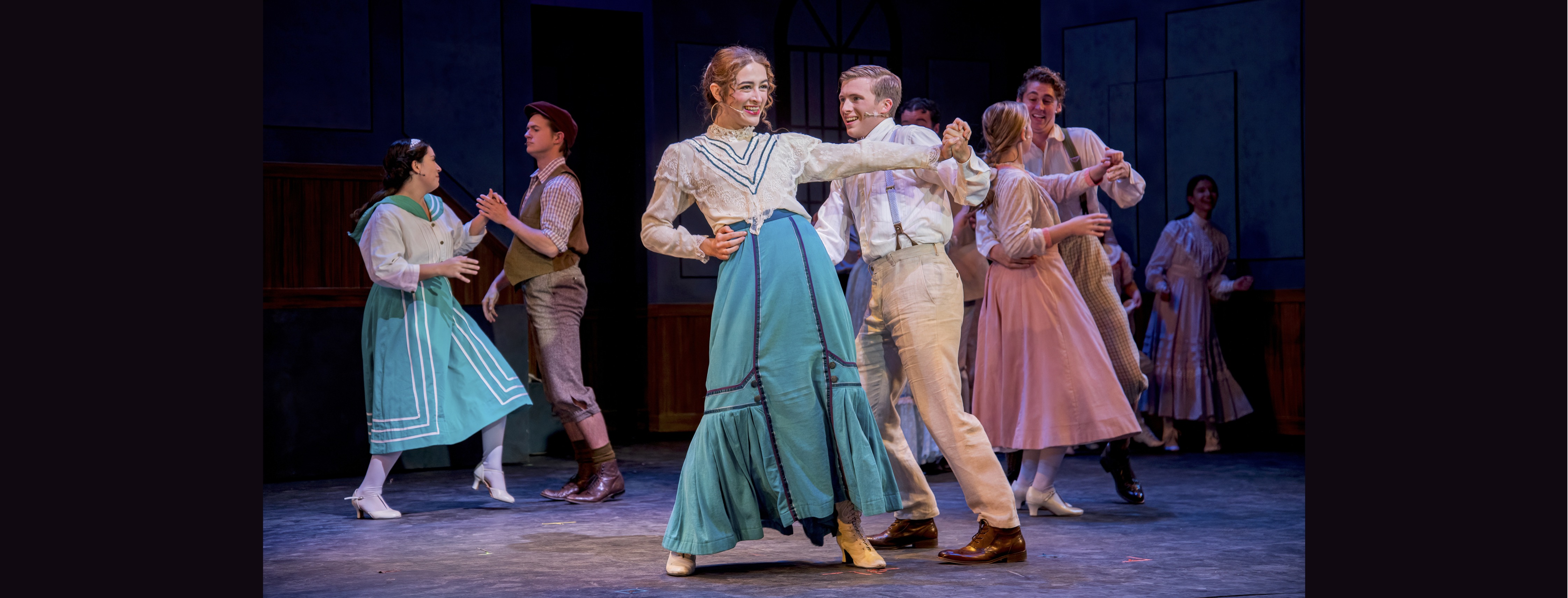 Characters dancing onstage