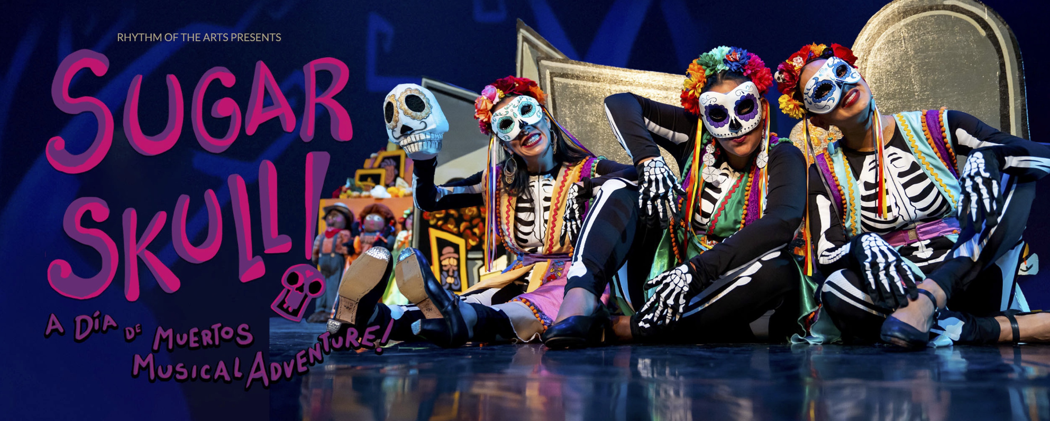 image of performers dressed in sugar skull attire with show title text