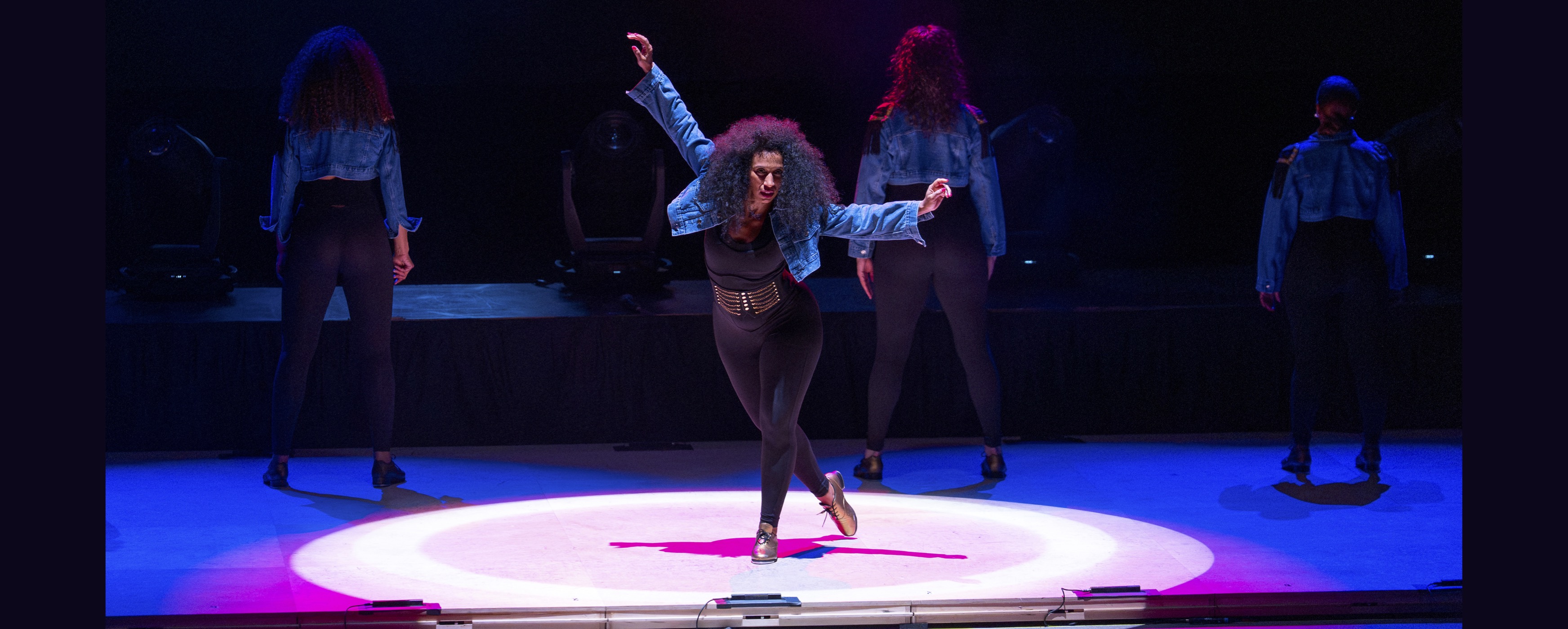 Image of dancing women onstage