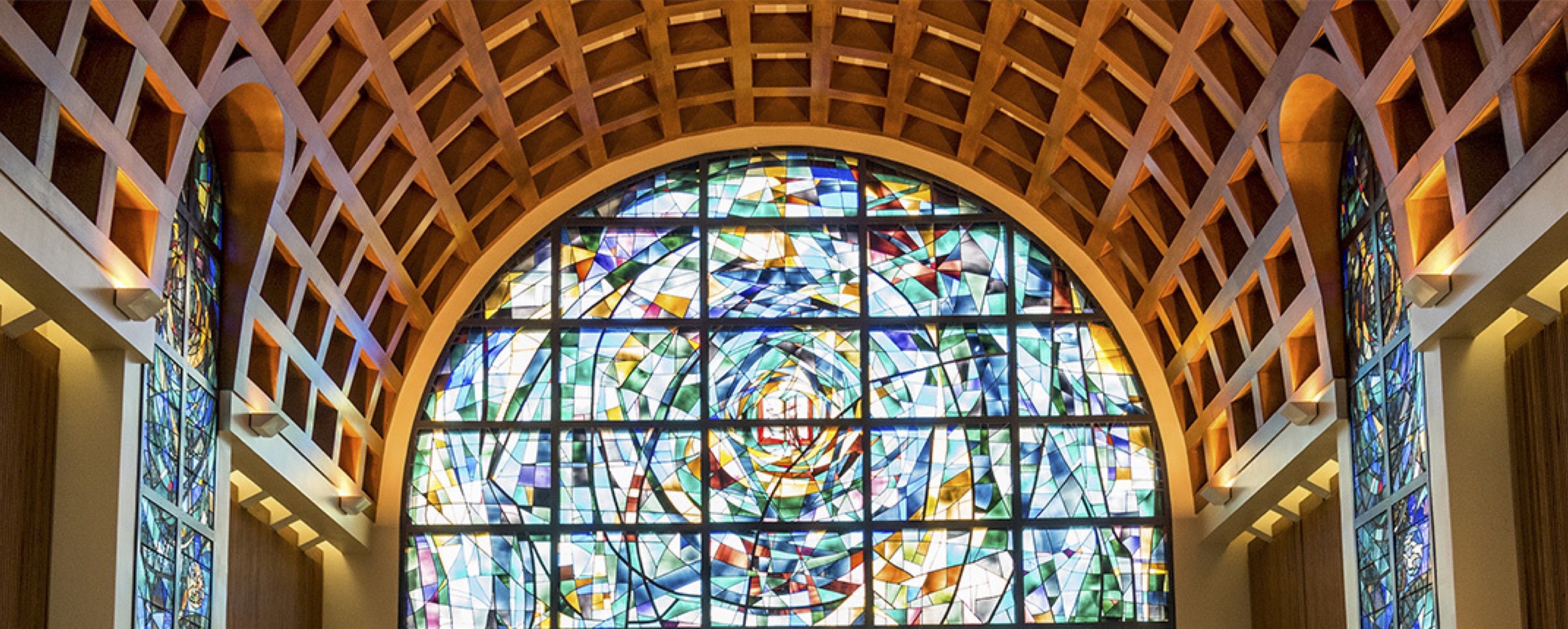 Image of the interior stained glass windows of Stauffer Chapel
