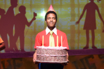 Boy with birthday cake